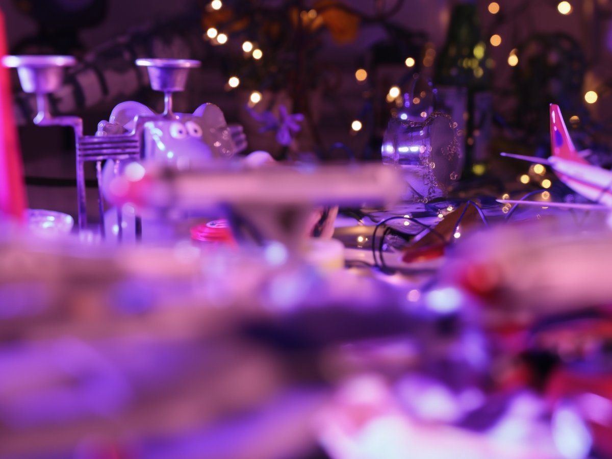 AnyBokeh result at f/2, refocused on point 2 on the candlestick, with soft foreground and background blur.